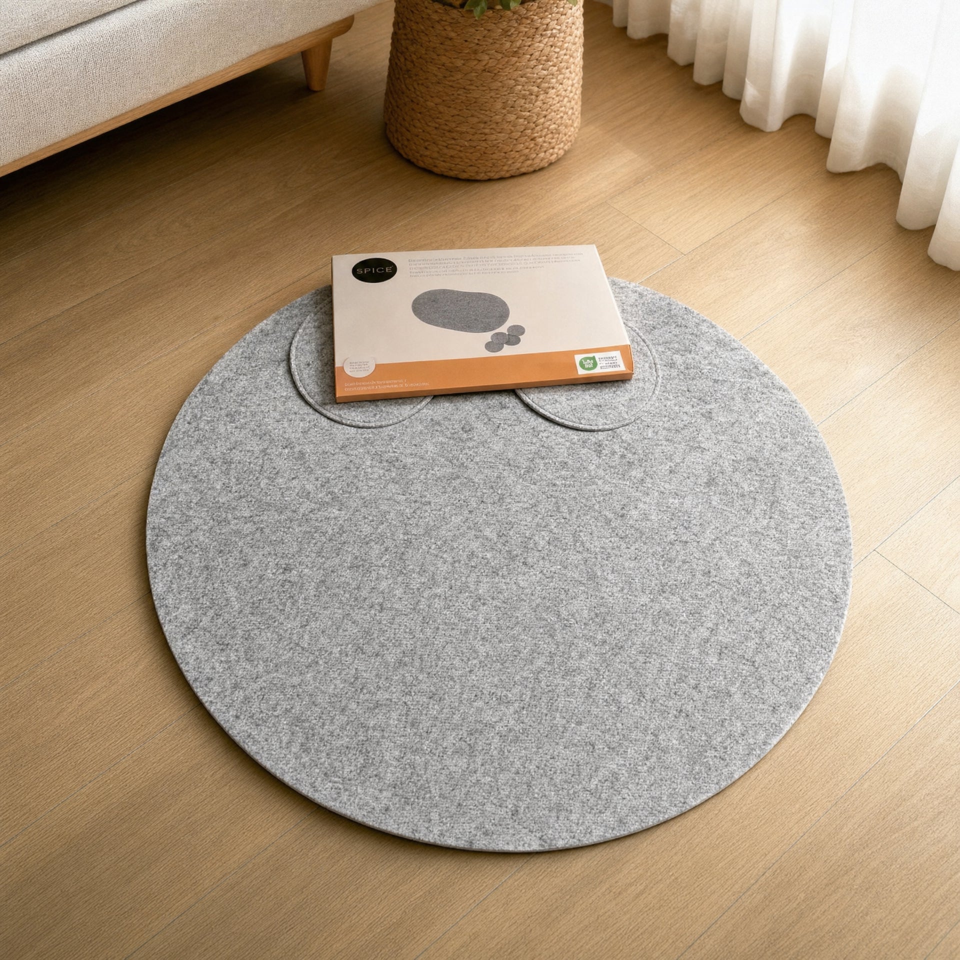 Alfombra redonda gris con textura uniforme