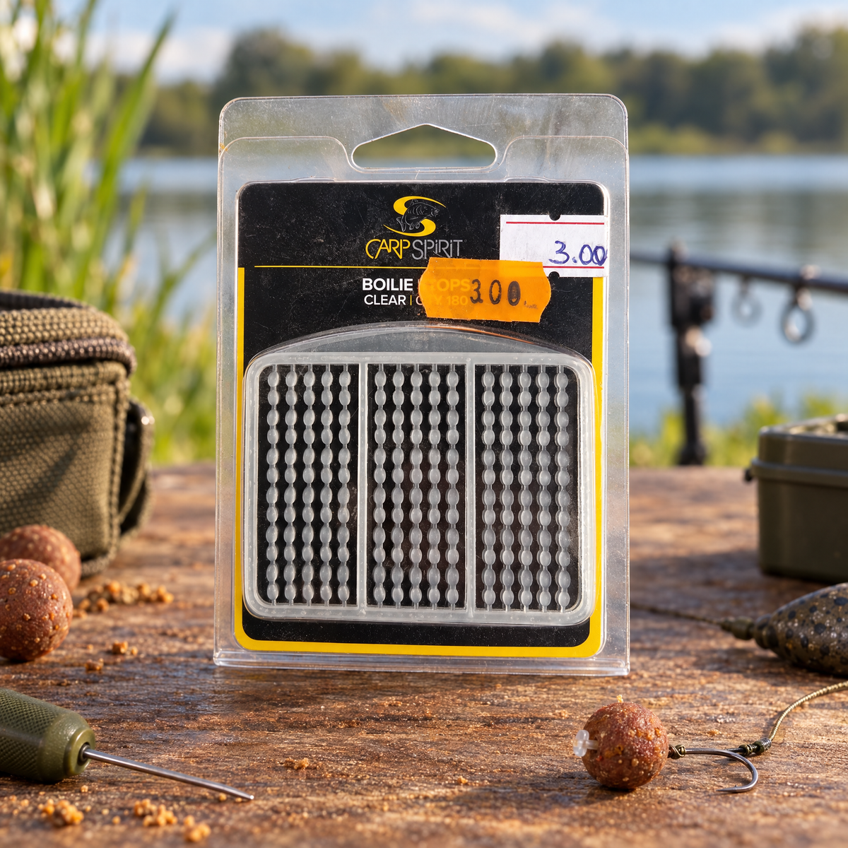 Envase Carp Spirit Boilie Stops Clear en ambiente de pesca; accesorios decorativos no incluidos