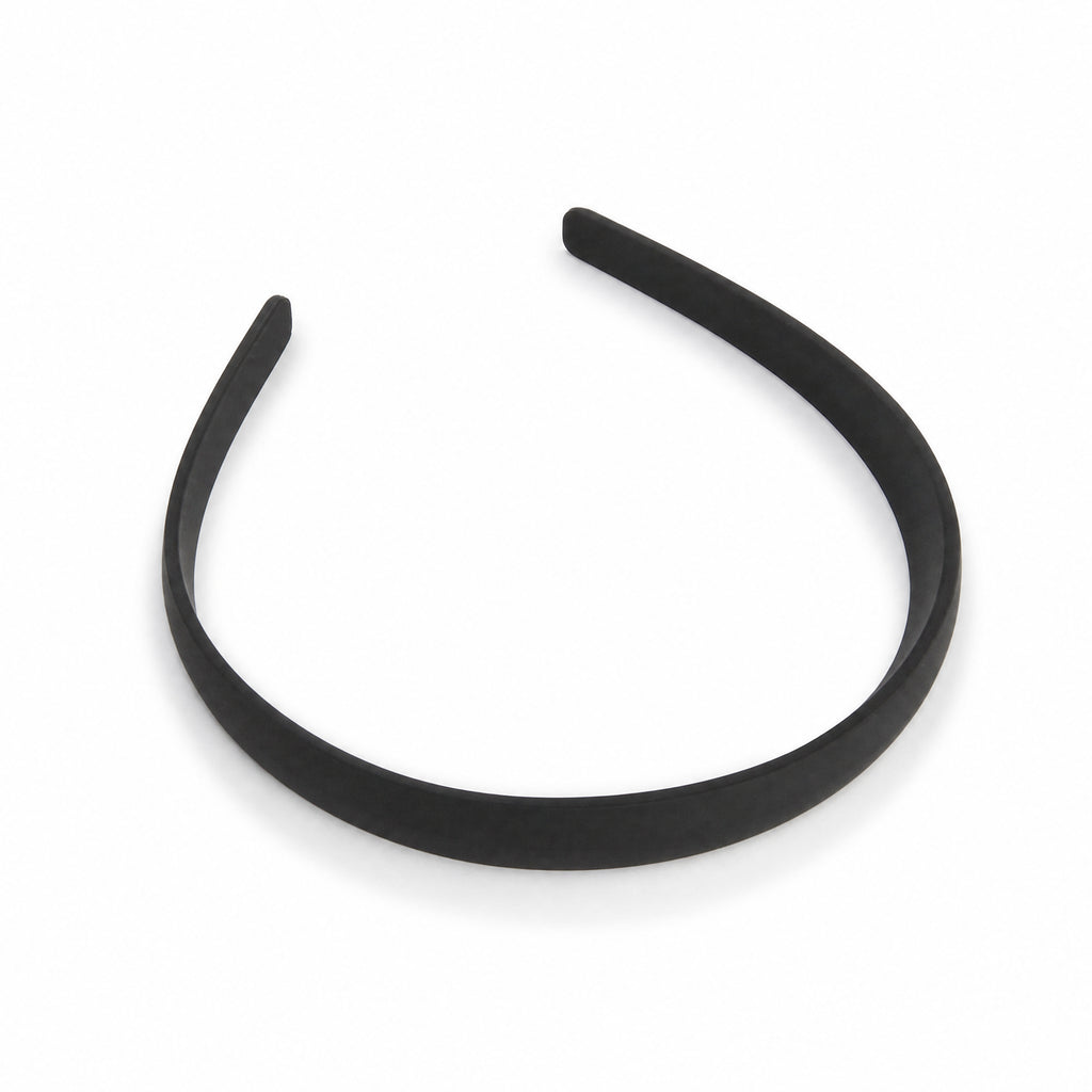 Diadema negra de una sola pieza con acabado liso y forma arqueada