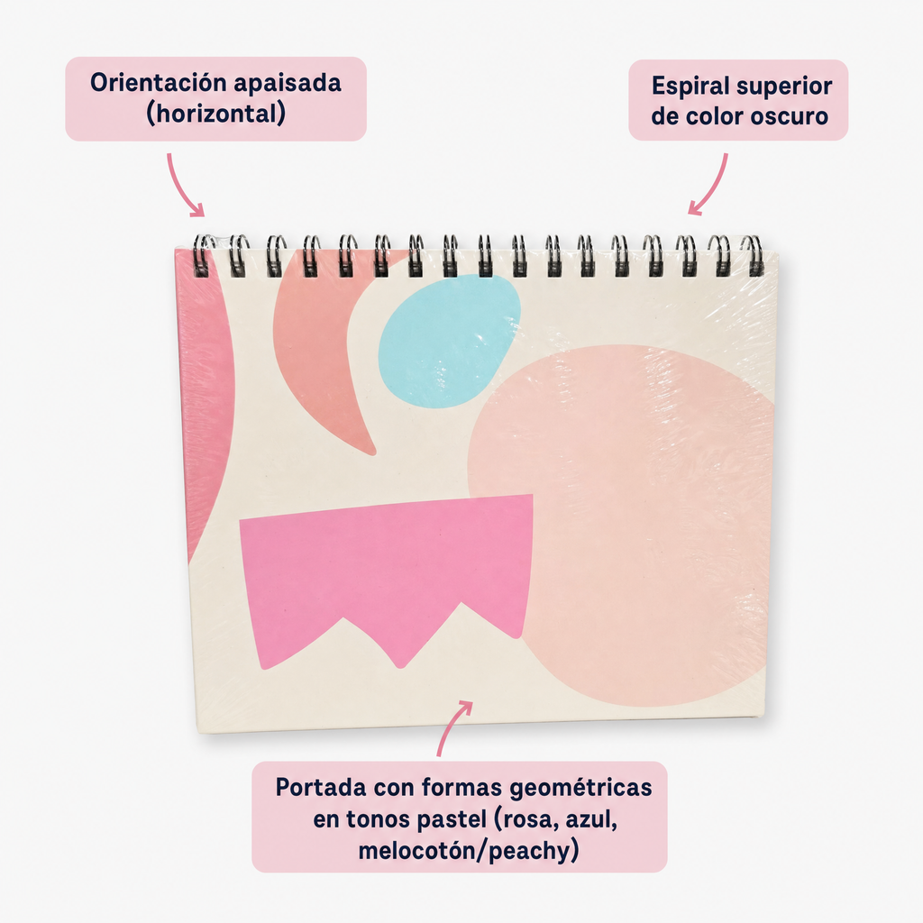 Cuaderno con espiral en el borde superior y portada geométrica rosa, azul y melocotón