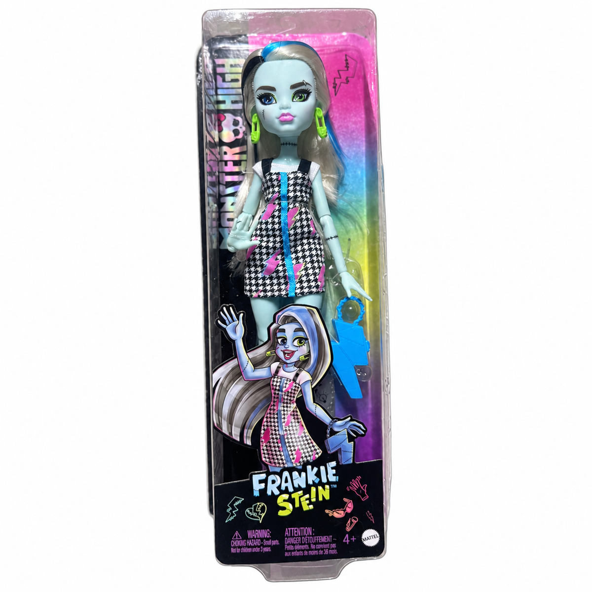 Monster High Frankie Stein en caja con vestido pata de gallo y bolso rayo azul