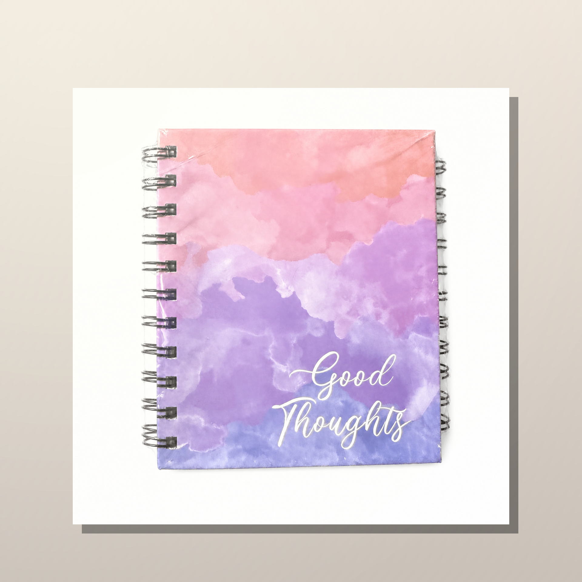 Cuaderno espiral Good Thoughts con portada de mensaje positivo y apertura plana