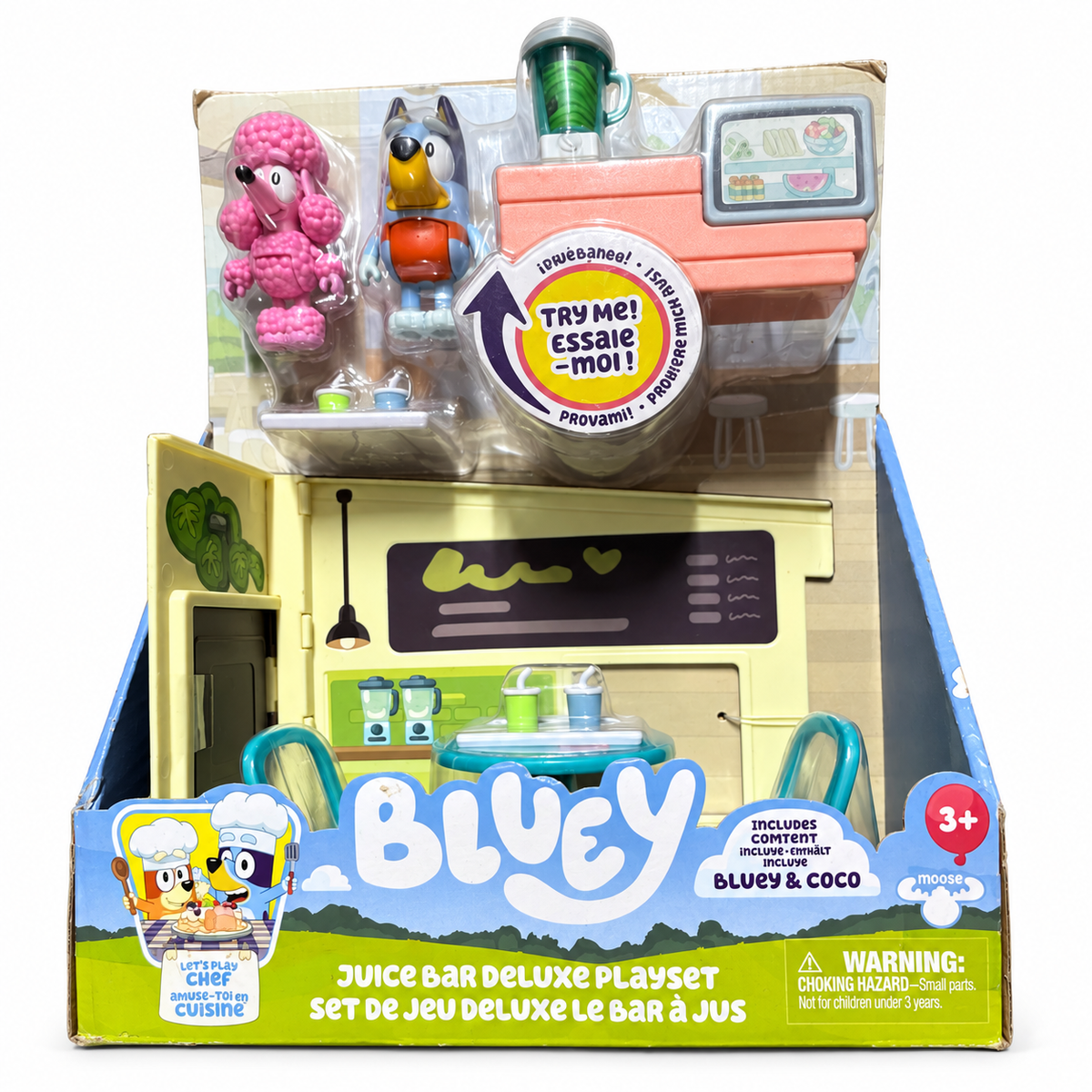 Puesto de zumos Bluey Deluxe con Bluey y Coco en embalaje original sobre fondo blanco