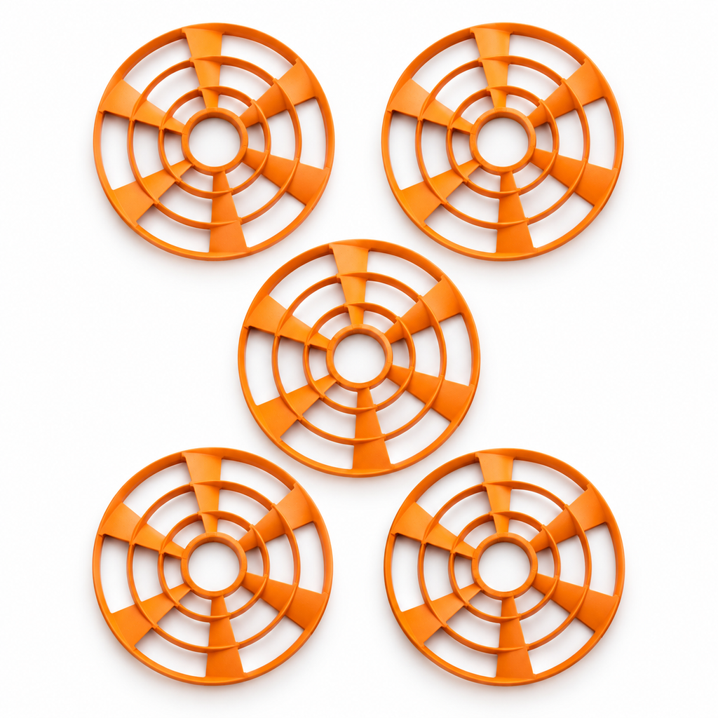 Pack de 5 discos naranjas Caldwell ClayCopter 110 mm sobre fondo blanco