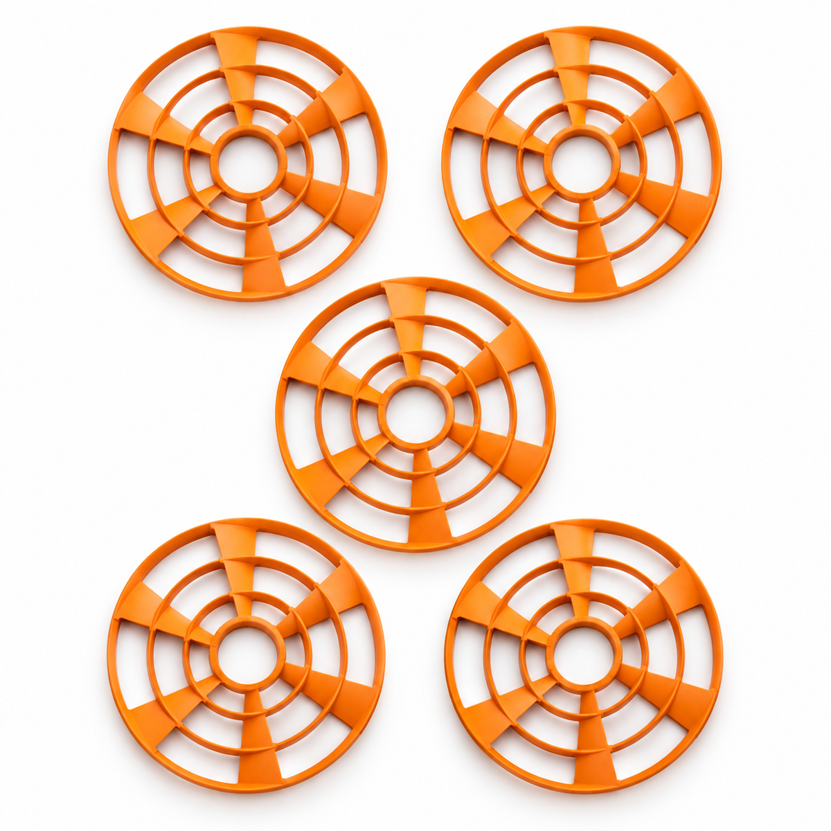 Pack de 5 discos naranjas Caldwell ClayCopter 110 mm sobre fondo blanco