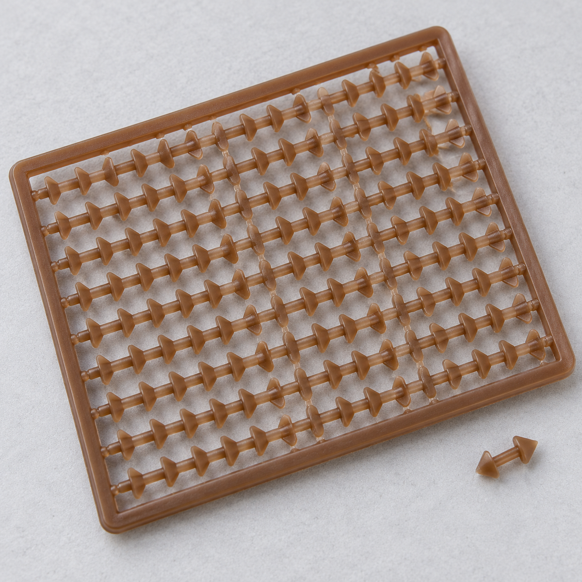 Carp Spirit Classic Boilie Stops Brown x100, detalle de la plancha
