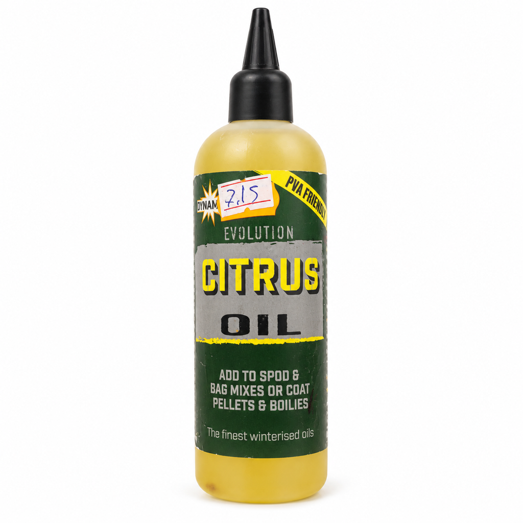 Dynamite Evolution Citrus Oil – aceite para cebos de pesca sobre fondo blanco