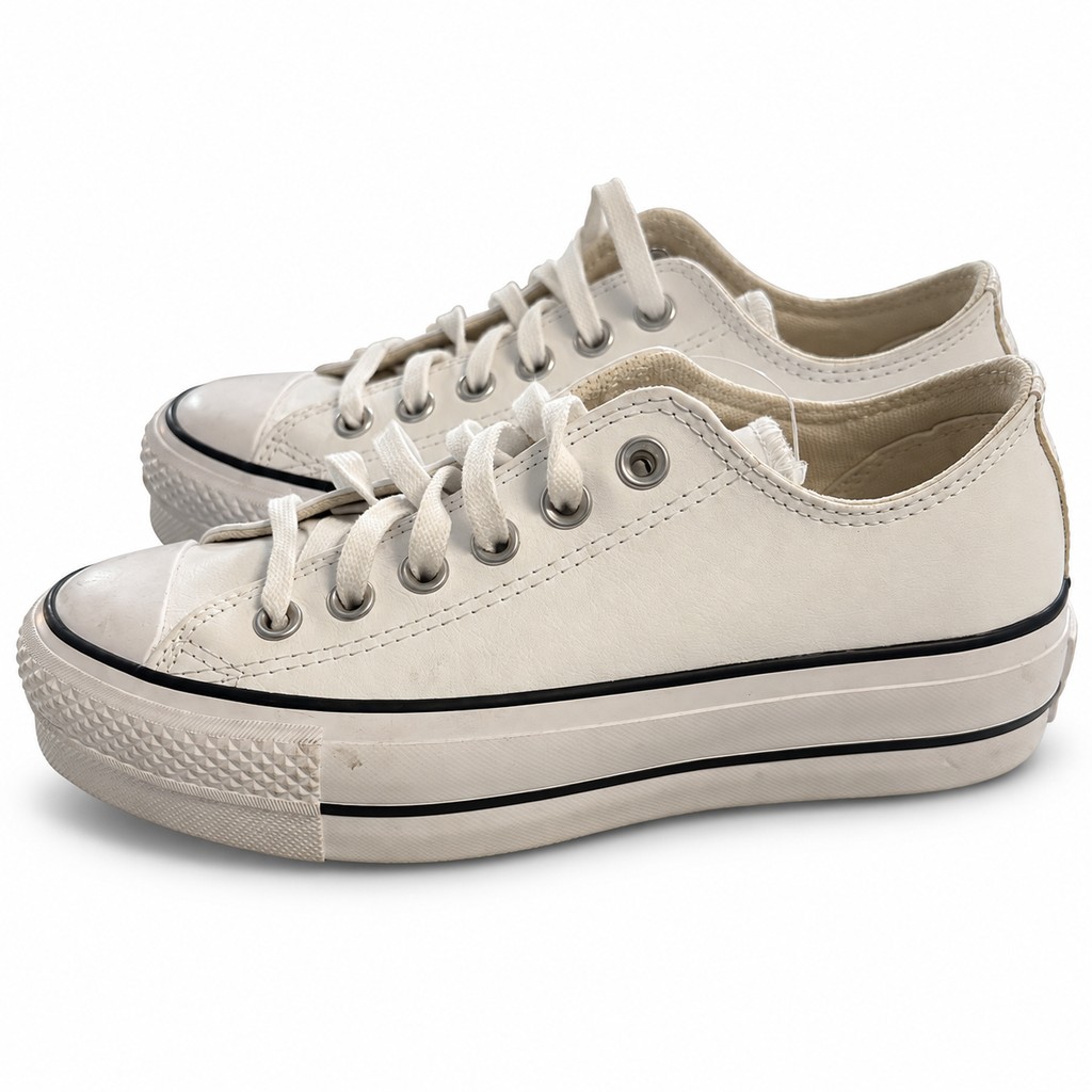 Converse All Star Lift blancas 561680C talla 36 — par sobre fondo blanco