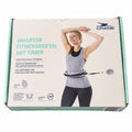 Caja CRANE de aro de fitness gris con temporizador; desgaste visible en el embalaje
