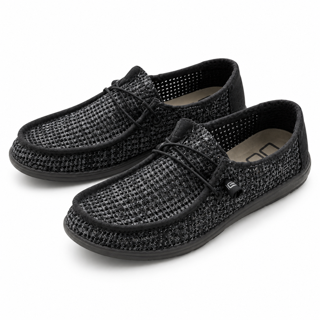 Mocasines HEYDUDE Wally Sox Perforated Black Grey sobre fondo blanco