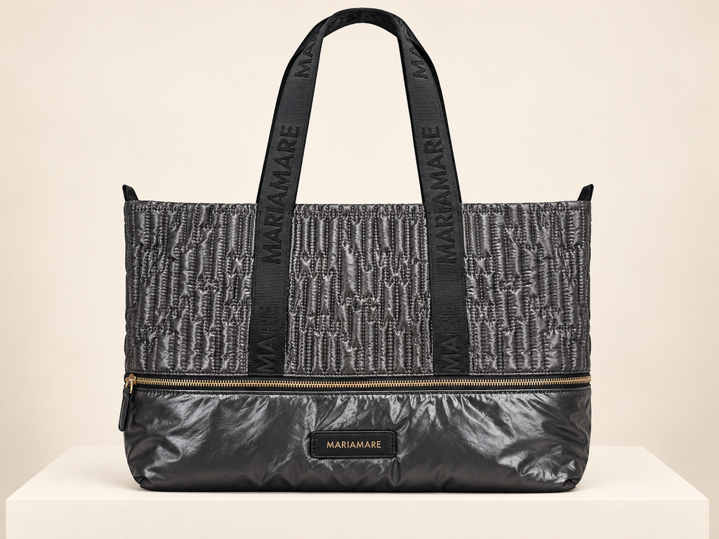 Bolso Mariamare negro metalizado con asas de cinta y cremallera dorada · presentacion
