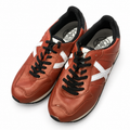 Zapatillas Munich cobre con X blanca talla 40, fondo blanco y roce visible en puntera
