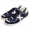 Zapatillas Munich azul marino brillo con detalle blanco, vista principal sobre fondo blanco