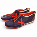 Zapatillas Munich moradas con X naranja y ribete crema · Talla 45 - portada blanca
