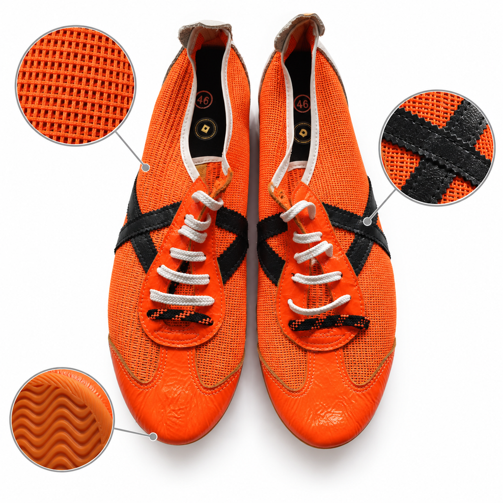 Características visuales de las zapatillas Munich naranjas de malla con detalles negros