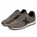 Zapatillas Munich gris topo con X negra sobre fondo blanco
