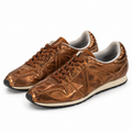 Zapatillas Munich cobre metalizado sobre fondo blanco