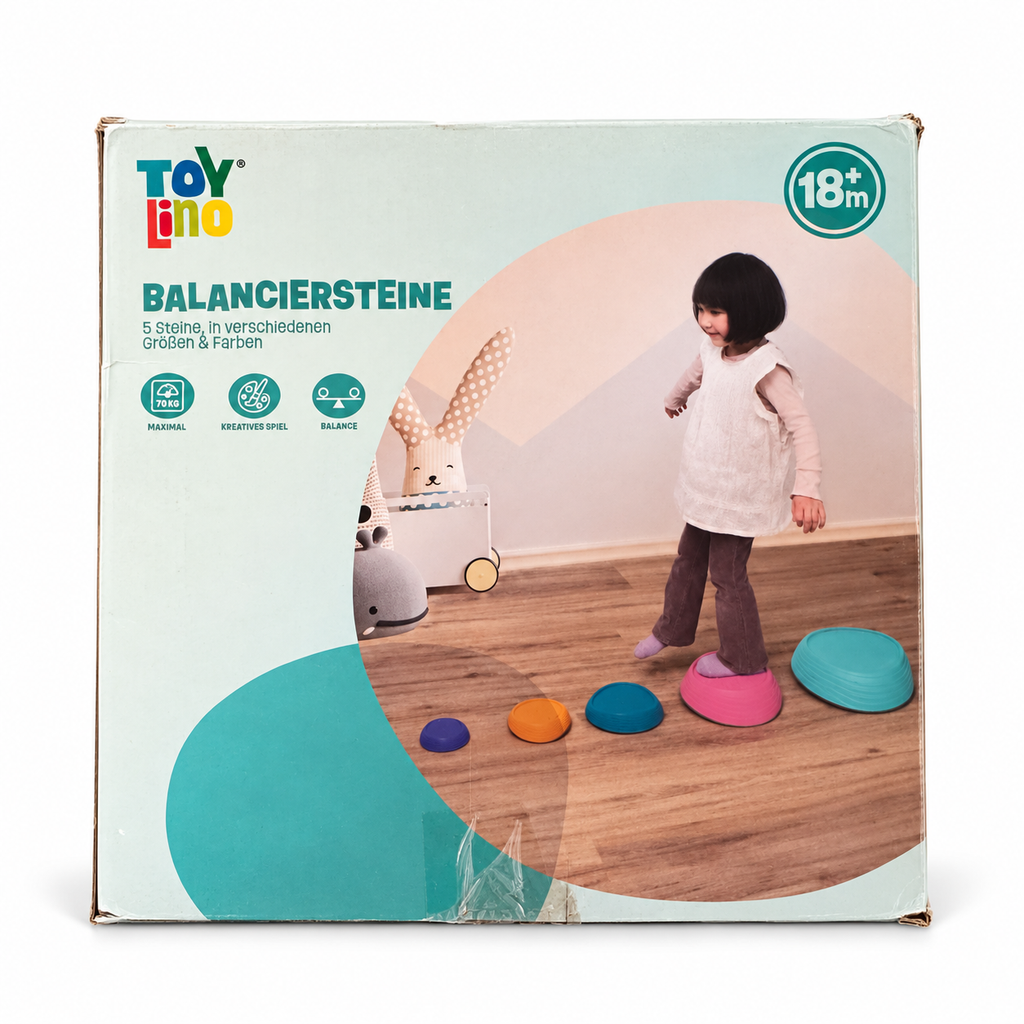 Caja Toy Lino de cinco piedras de equilibrio sobre fondo blanco