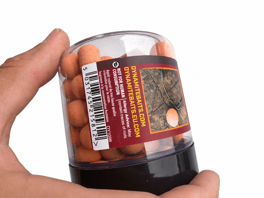 Dynamite CompleX-T Fluro Pop-Ups y Dumbells 15 mm sobre fondo blanco