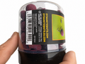 Dynamite Mulberry Plum Foodbait Pop-Ups 15 mm sobre fondo blanco