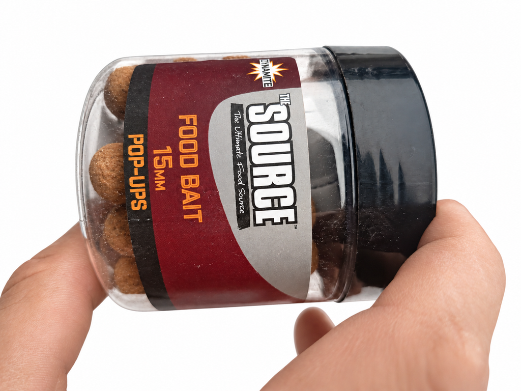 Dynamite The Source Food Bait Pop-Ups 15 mm sobre fondo blanco