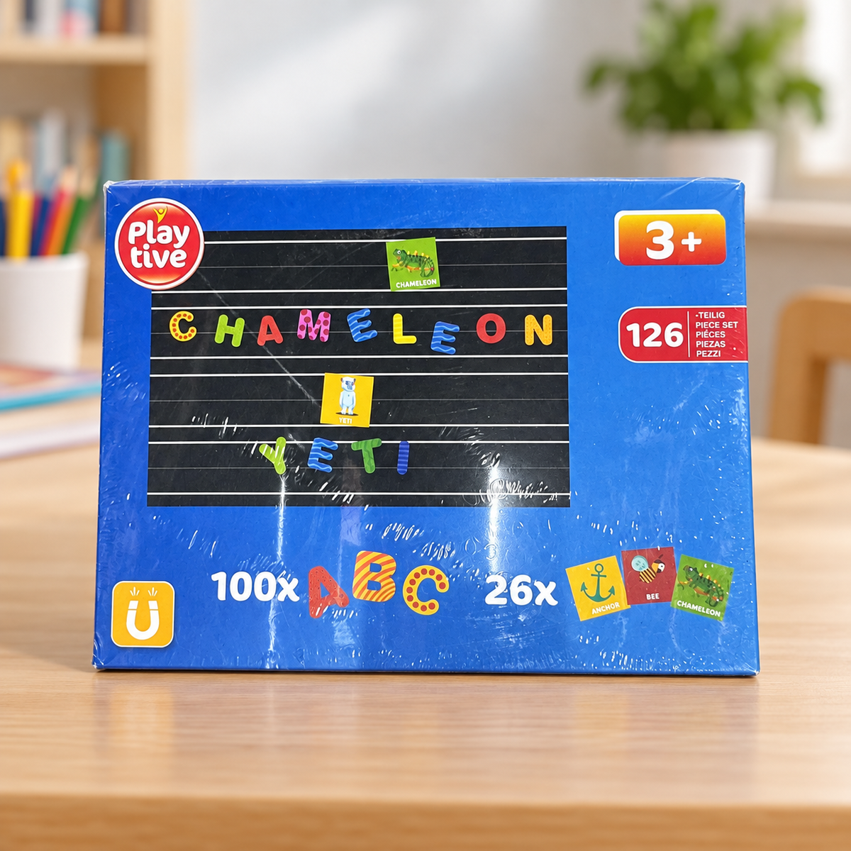 Juego Playtive de letras magnéticas en su caja original sobre escritorio