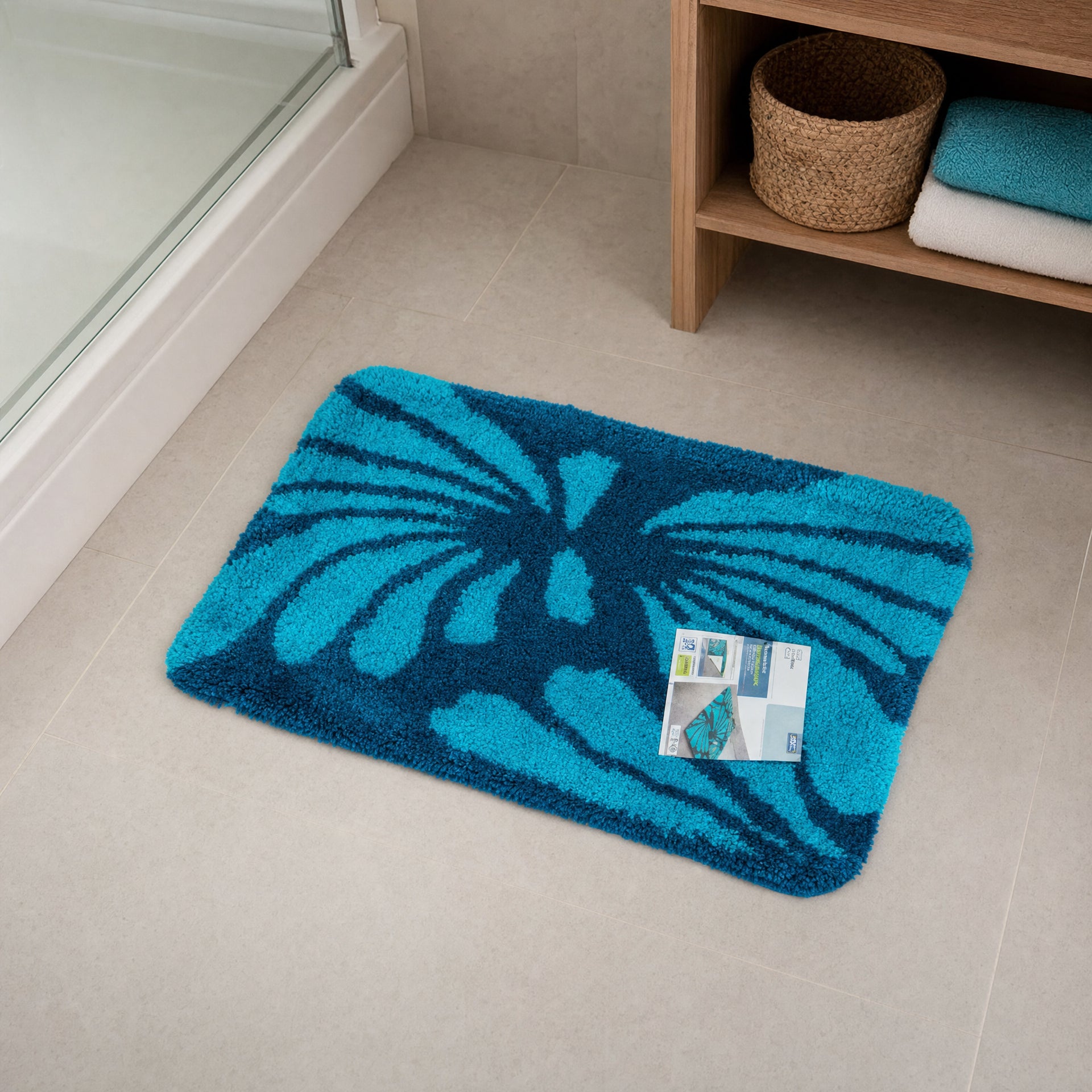 Alfombra de baño con motivo de mariposa en azul y turquesa, pelo denso