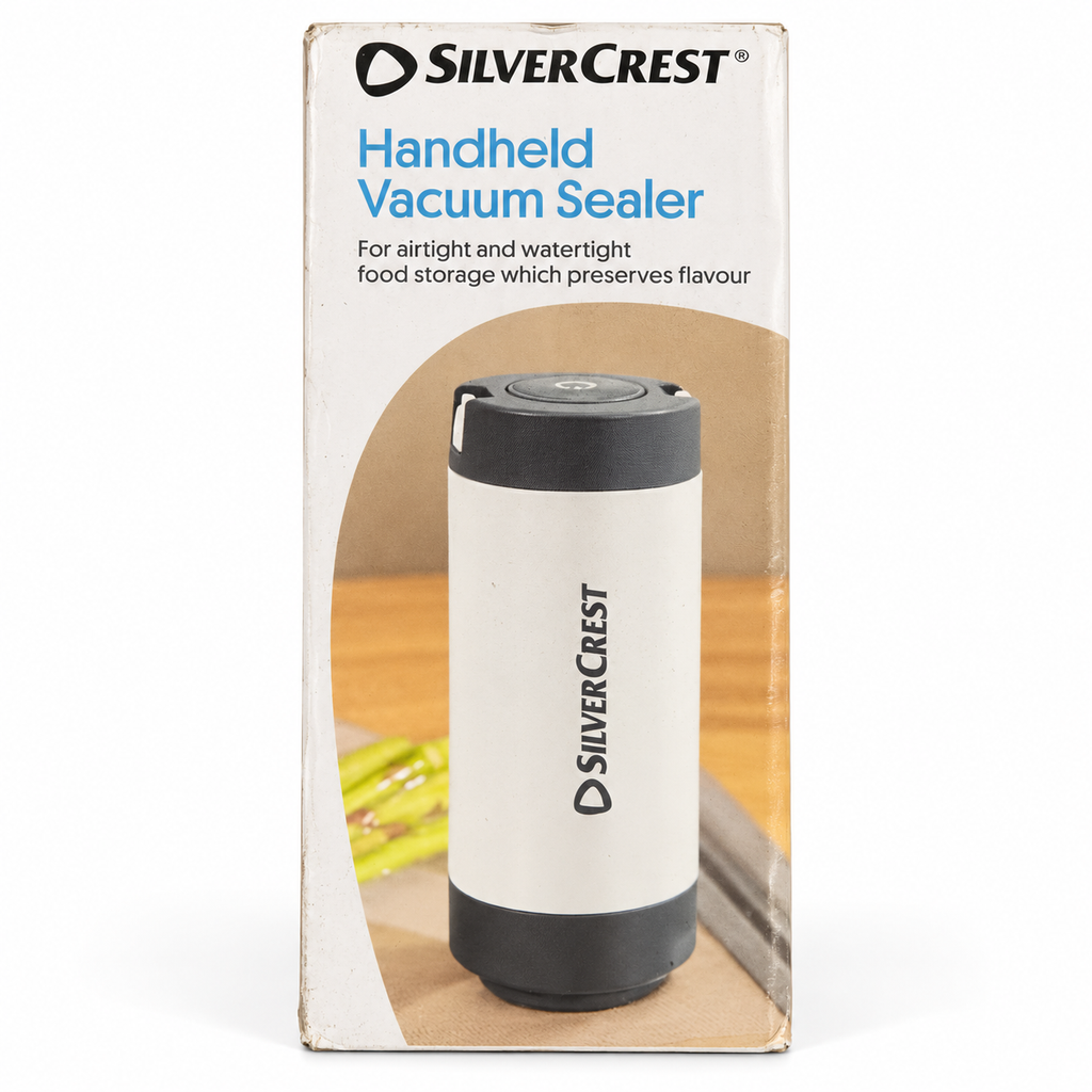 SilverCrest envasadora al vacío portátil en su embalaje con marcas visibles