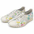 Zapatillas Munich blancas con estampado floral multicolor sobre fondo blanco